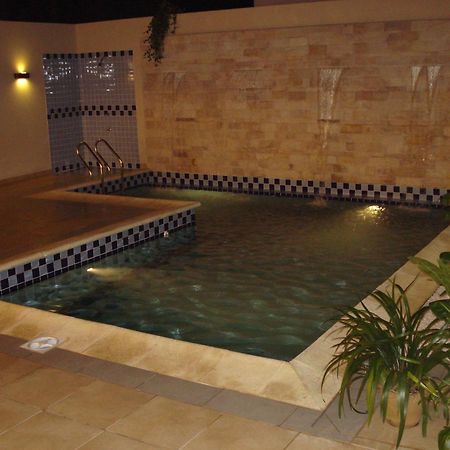 Olimpo Hotel & Suites Итаугуа Экстерьер фото