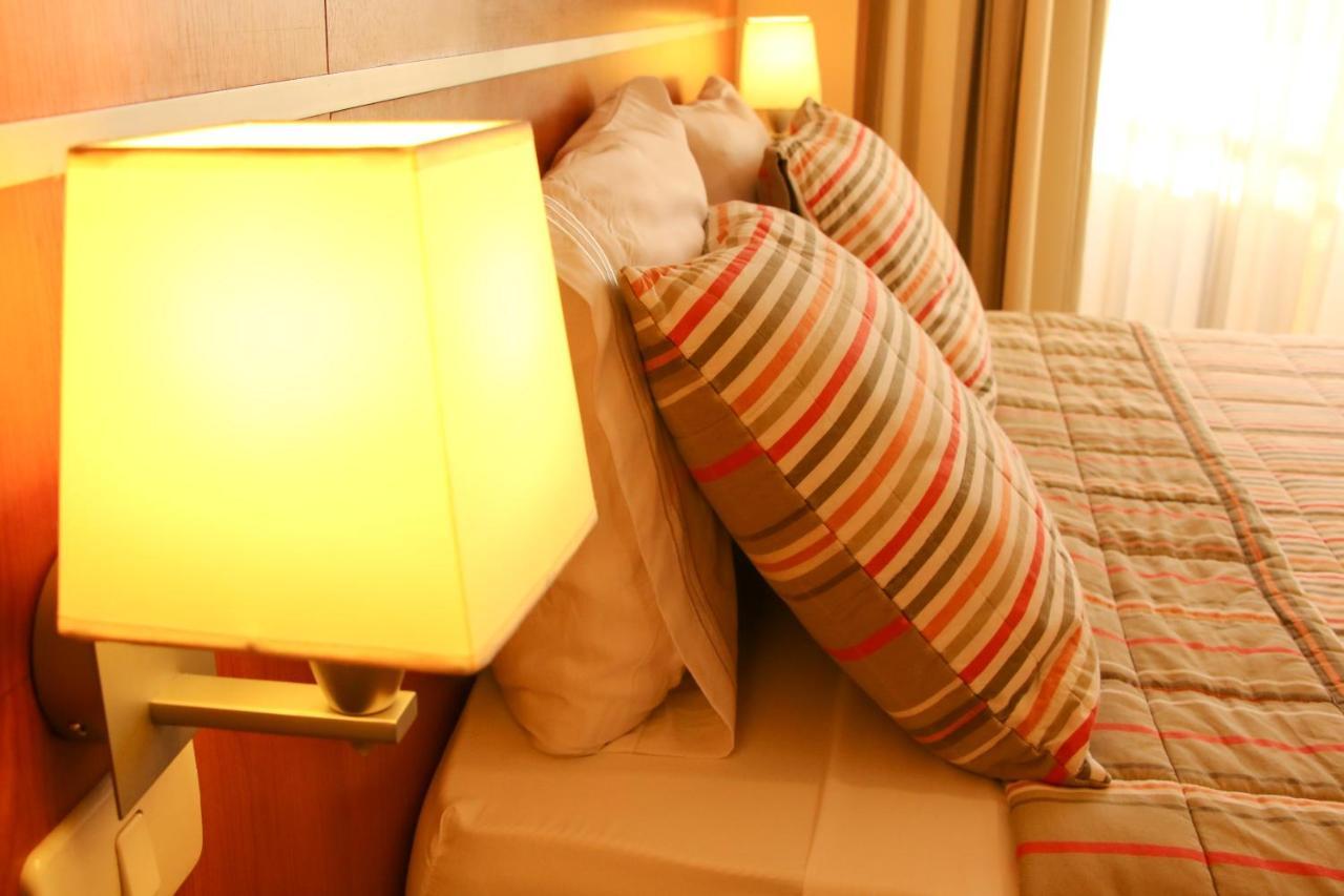 Olimpo Hotel & Suites Итаугуа Экстерьер фото